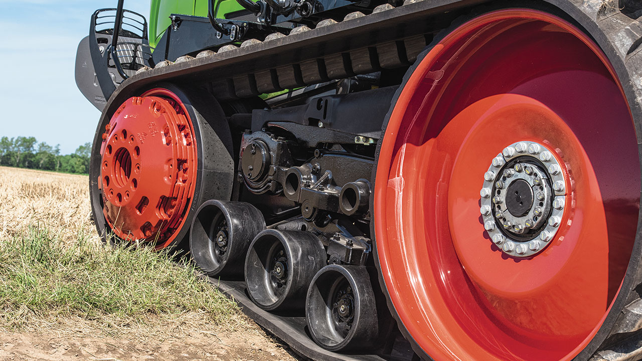 Close-up of Fendt 900 Vario MT track system showing AGCO-engineered rollers and drive wheels for superior traction and field performance.