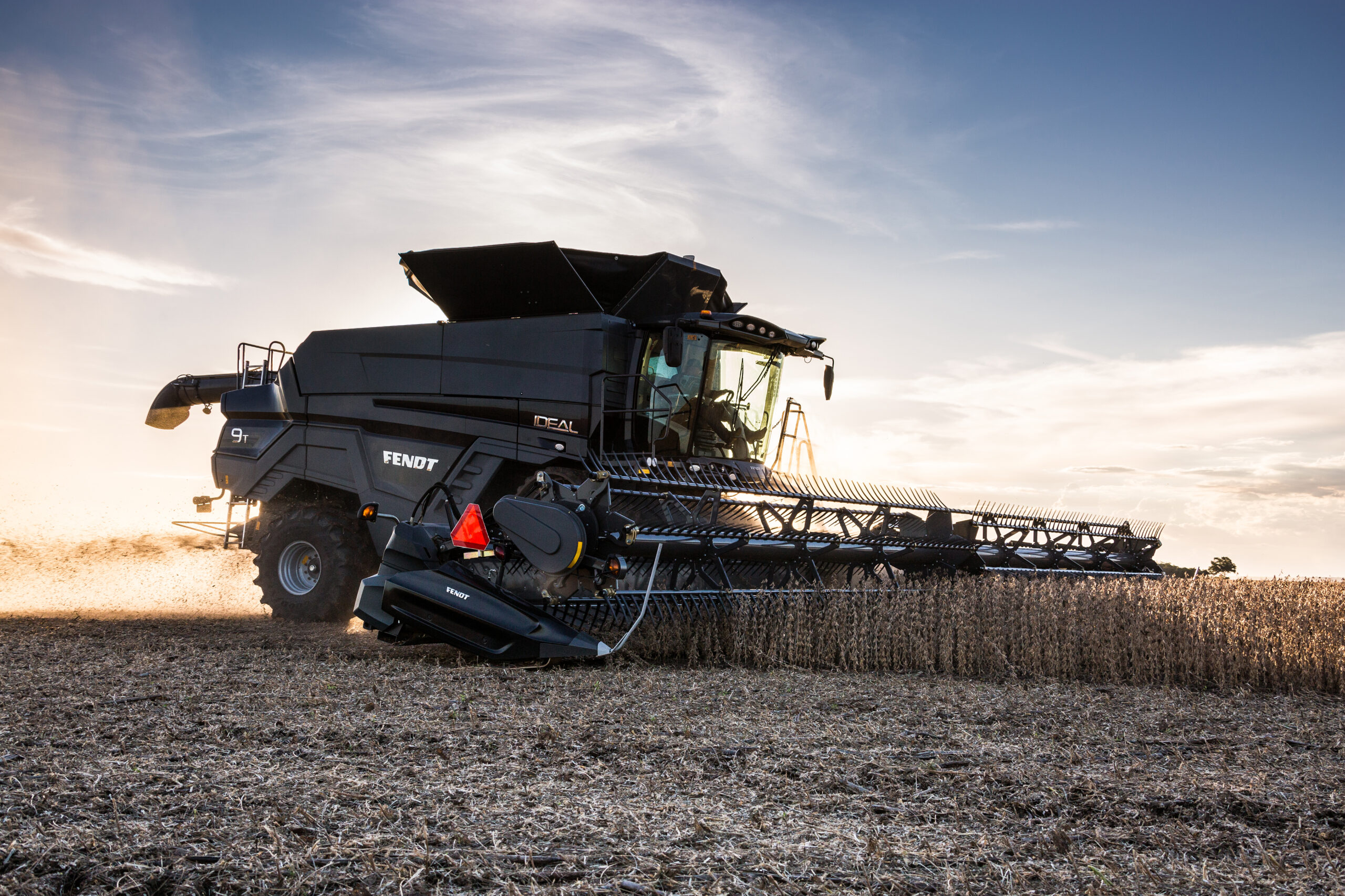 Thumbnail for Fendt IDEAL combine harvesting soybeans at sunset with high-capacity header, built for efficiency and precision in the field.