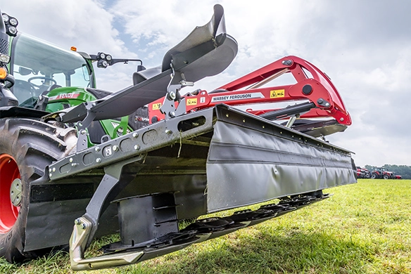 Massey Ferguson DM367 front mower attachment on Fendt tractor, shown on grassy field.