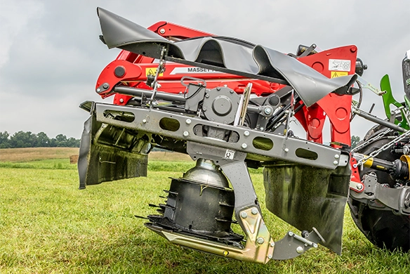 Close-up of Massey Ferguson 367 mower blades and cutting deck.