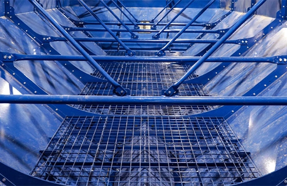 Interior shot of Brandt 2500DXT grain cart featuring cross augers and internal reinforcement for reliable grain flow and durability.