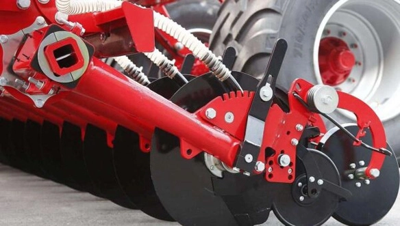 Close-up of HORSCH Avatar disc opener assembly and seed tubes, highlighting mechanical precision and rugged durability of the seeder components.