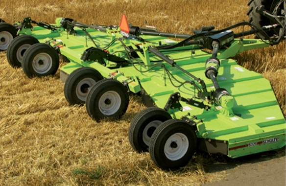 Schulte rotary cutter with multiple wing sections designed for wide-area mowing and stubble management on agricultural fields.