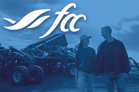 FCC logo above a photo of two people walking in front of a large agricultural implement