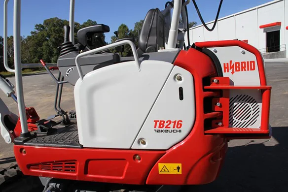 Side view of Takeuchi TB216H Hybrid excavator with clear hybrid system branding and durable track frame.