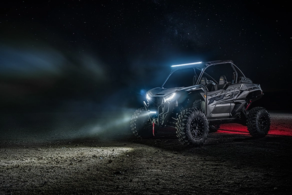 Kawasaki Teryx KRX 1000 illuminated in a night off-road setting with LED lighting