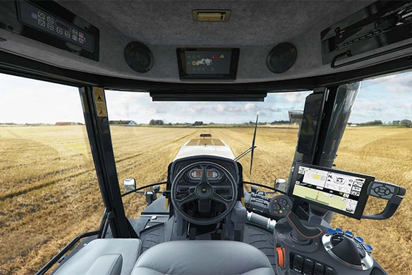 TerraGator cab interior with steering wheel, display screens, and operator controls