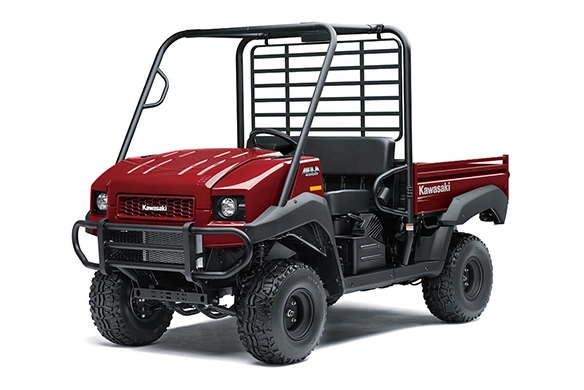 Front angled view of a red Kawasaki Mule 4000 showcasing its grille, headlights, and compact utility design.