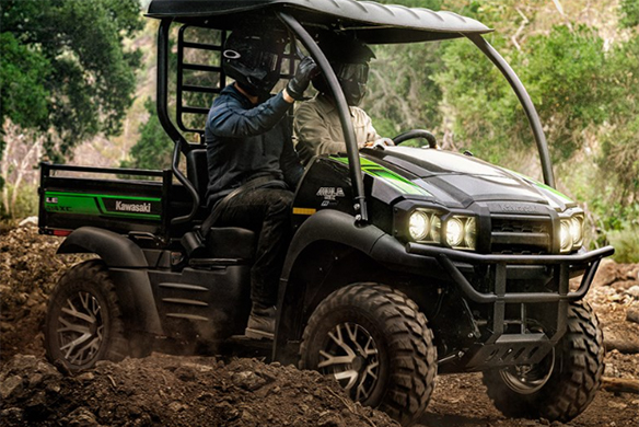 Side profile of a Kawasaki Mule 2-passenger side-by-side.