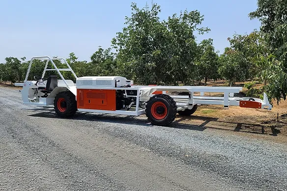 Weldcraft Industries bin carrier frame used for transporting nut harvesting bins between orchard rows and processing points.