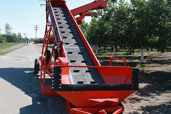 Weldcraft Industries field elevator for nut handling operations, efficiently lifting harvested crop into trailers or stockpiles.
