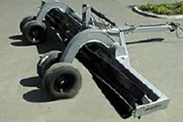 Wilcox spiral attachment crumbler in transport position, designed to reduce soil compaction and improve seedbed uniformity.