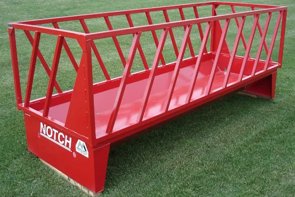 Notch feeder on display on a green, grass field.