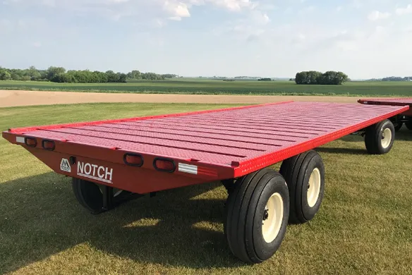 Notch manufacturing steel wagon in use behind a Massey Ferguson tractor (no pictured).