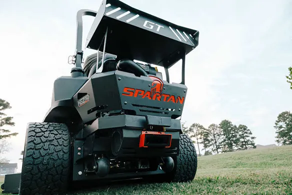 Rear view of a Spartan KGZ-XD zero-turn mower featuring commercial-grade construction and wide rear tires for stability