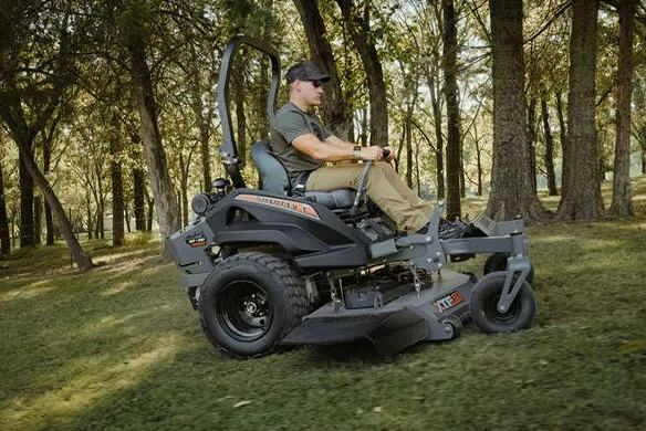 Side view of a Spartan RT-HD zero-turn mower built for smooth, controlled mowing on uneven residential terrain