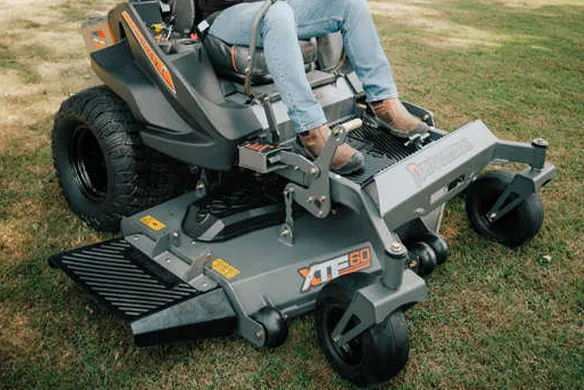 Top and front view of a Spartan RZ-XD zero-turn mower built for high-performance residential and acreage mowing