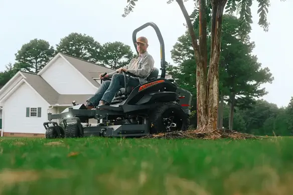 Front quarter view of a Spartan SRT-XDe zero-turn mower engineered for top-tier comfort and high-output performance