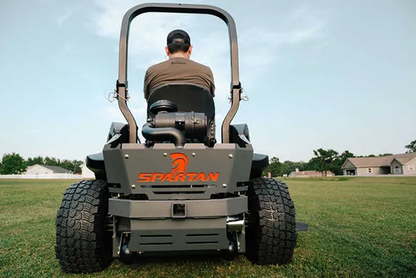 Rear view of a Spartan SRT-XDe zero-turn mower featuring advanced suspension and commercial-grade durability