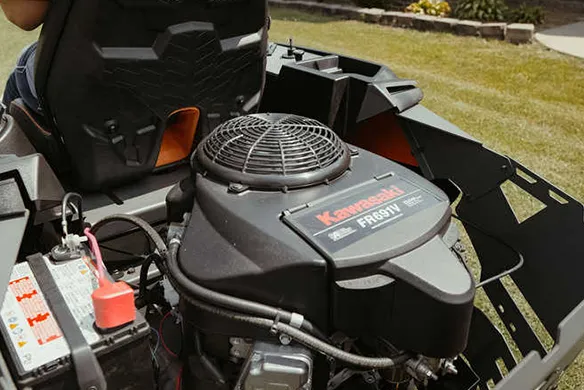 Close up view of Kawasaki engine on Spartan Shield zero-turn mower.