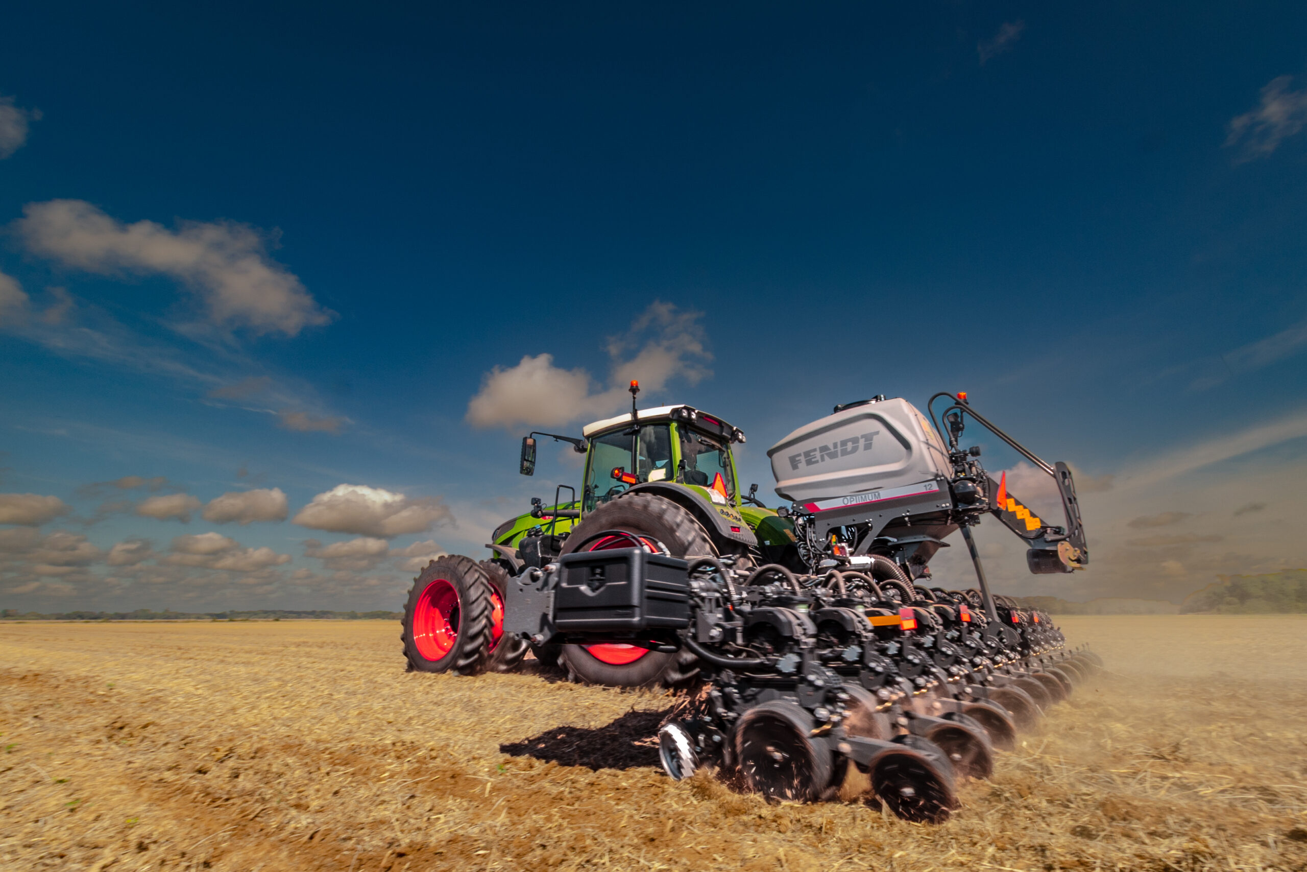Rear view of a Fendt Optimum planter operating in a field.