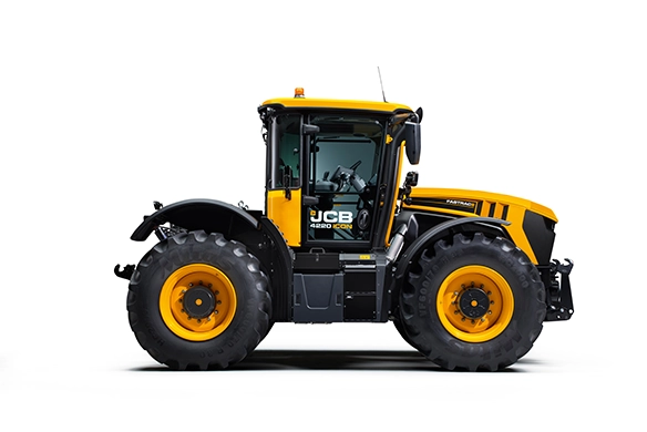 Side profile of a JCB 4000 Series agricultural tractor, showcasing its robust frame, large tires, and high-performance ag design