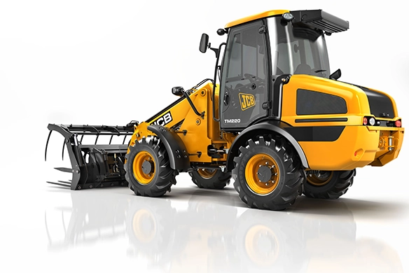 Rear studio view of JCB TM220 telescopic wheel loader showing compact agricultural design