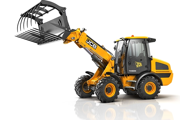 JCB TM220 telescopic wheel loader shown with grab attachment for bale and material handling