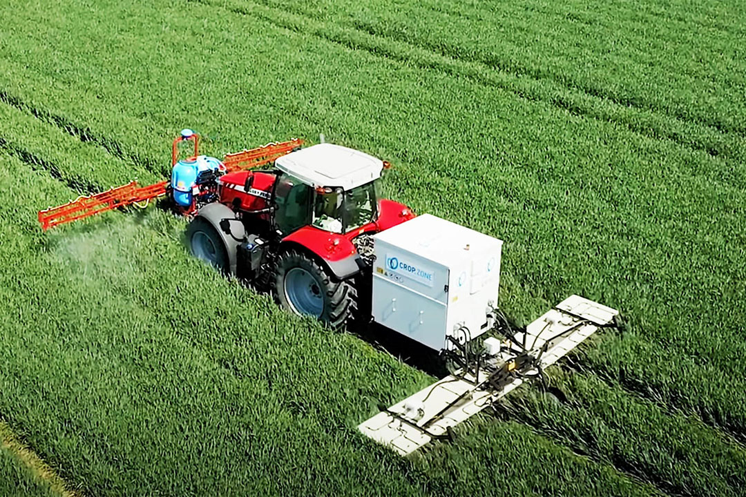 Tractor in field using crop zone kit